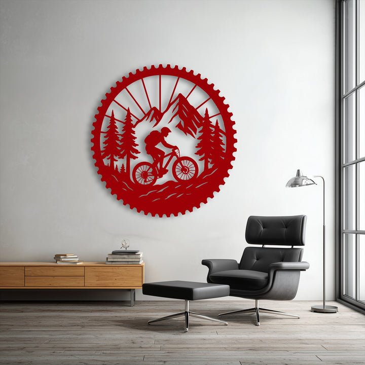 The vibrant red, matte finish of this precision-cut decorative metal art depicts a captivating mountain bike adventure.