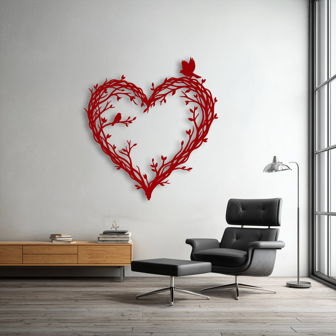 A black leather armchair, ottoman, and silver lamp occupy the foreground, harmonizing with the elegant Whispering Love heart metal artwork.