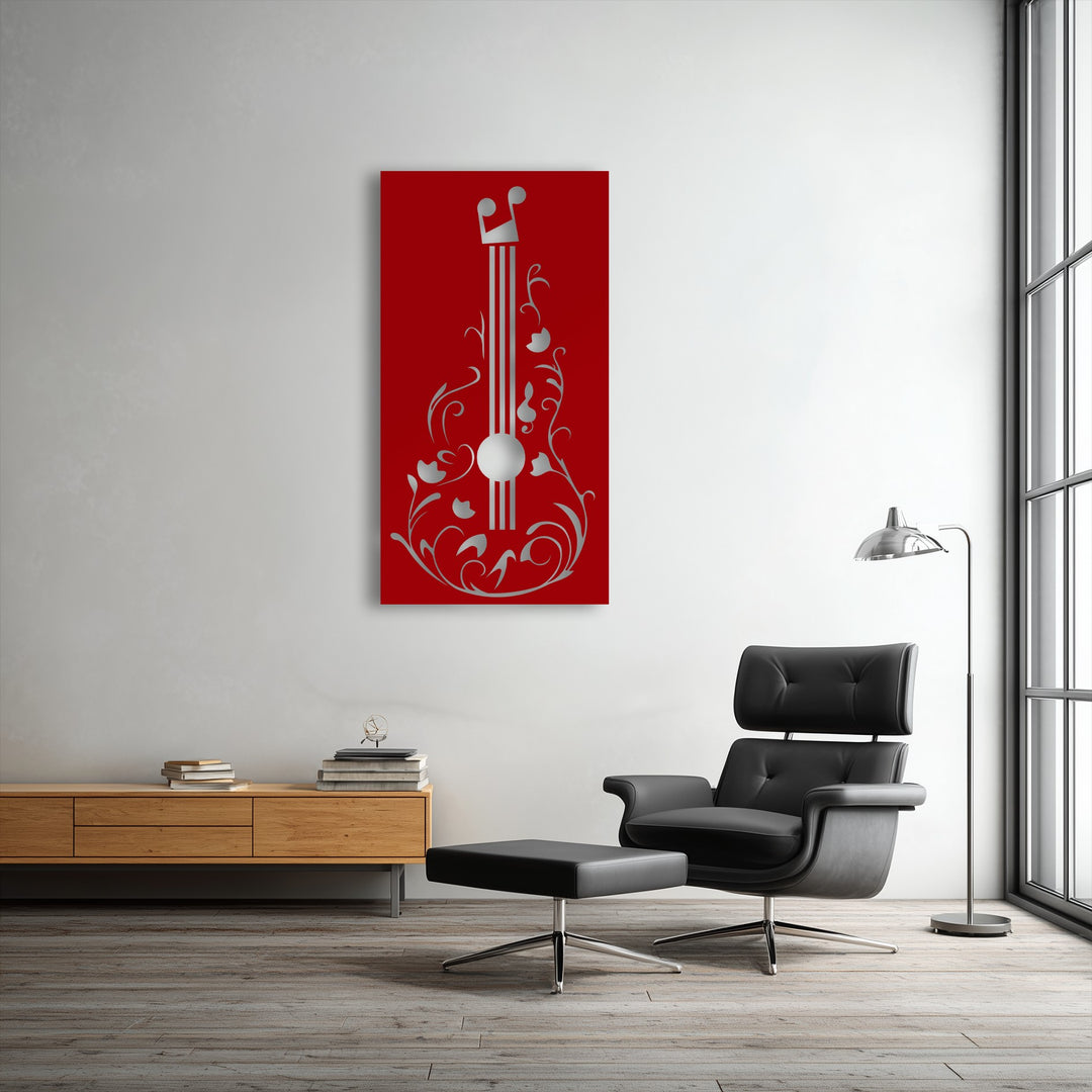 Striking color contrast is evident in the vibrant red floral guitar metal artwork against the subdued white wall.