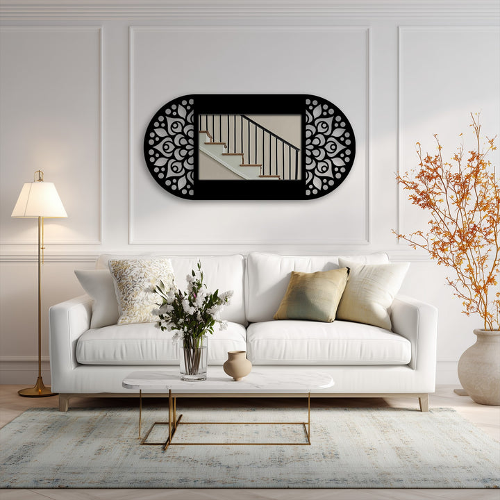 Highlighting the layering effect, the mandala floral pattern on this oval modern mirror features a decorative black metal artwork frame adding depth to any interior space.