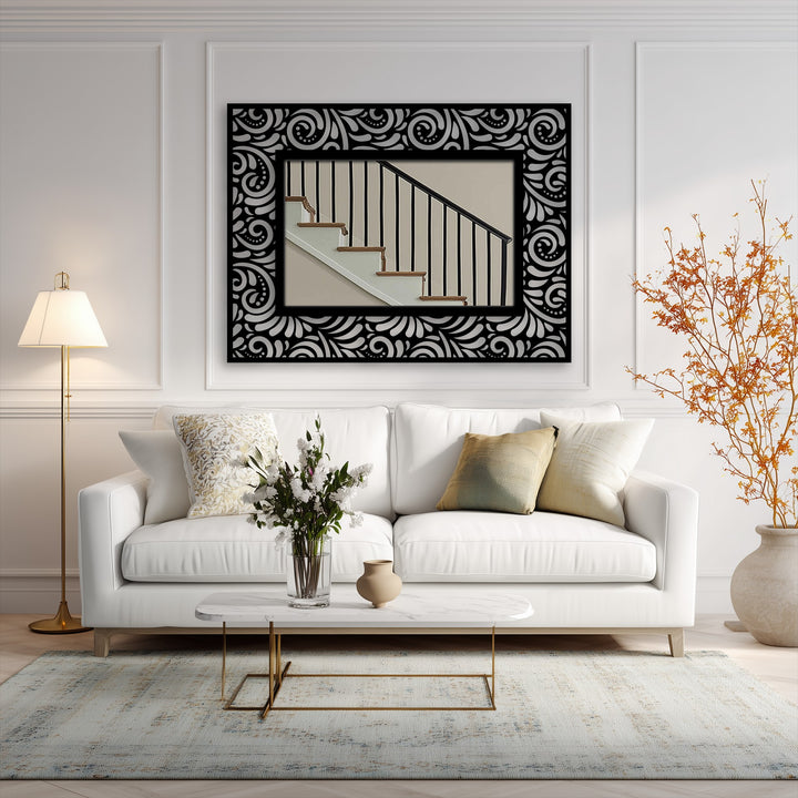 Showcasing the layering effect, this ornate floor mirror, framed with black metal artwork and floral scrolls, adds depth to the interior.