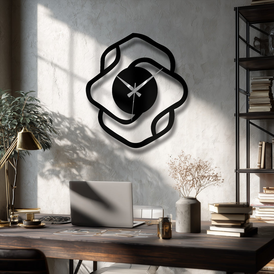 Black is the dominant color in this metal art for wall, highlighting the abstract organic shape of the modern metal wall clock.