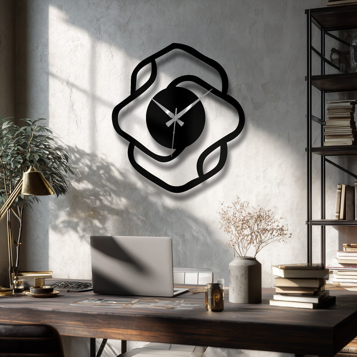 Black is the dominant color in this metal art for wall, highlighting the abstract organic shape of the modern metal wall clock.