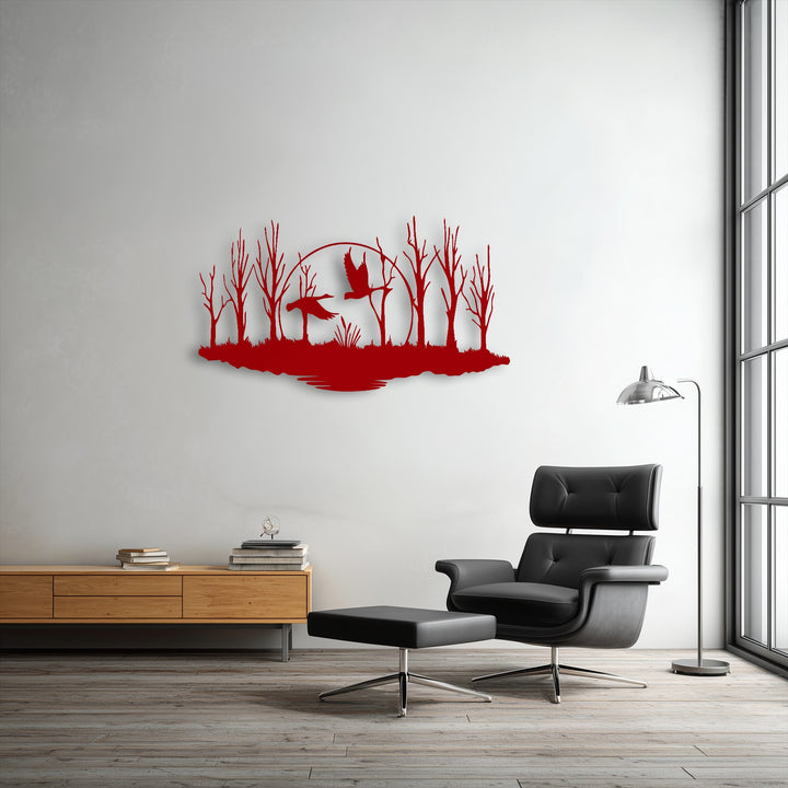 The rich, vibrant red finish of the metal artwork brings to life the silent marsh and flying birds forest design.
