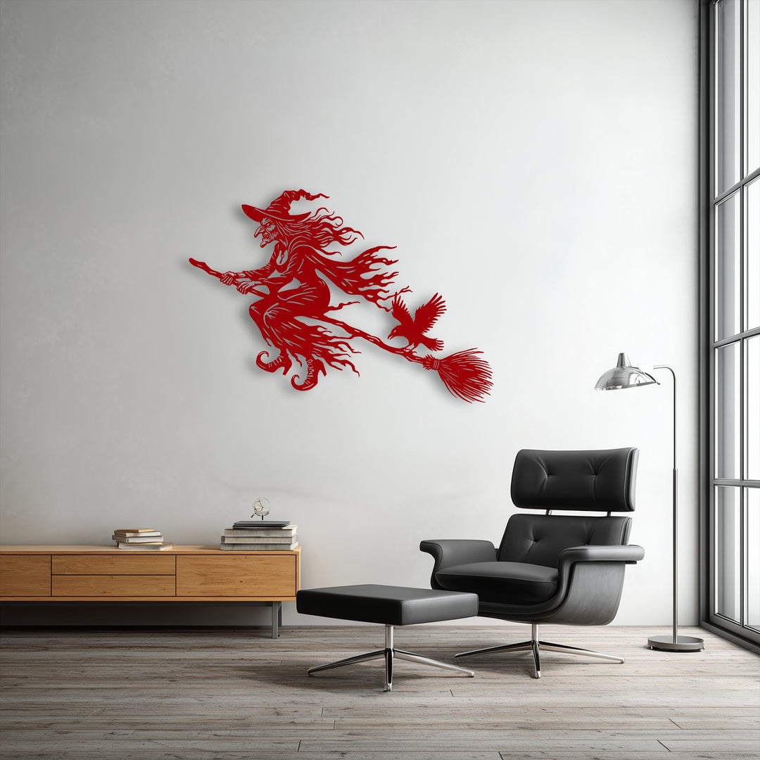 An enchanting yet eerie mood is created by the dramatic flying witch metal wall decor with its raven on a broomstick.