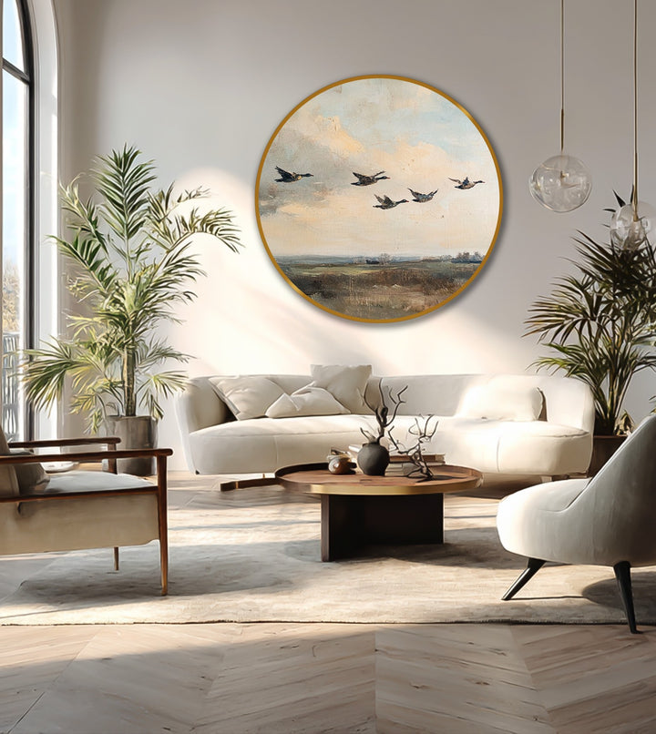 Featuring strong color contrast, this round oil painting home decor presents a vintage scene of flying ducks against a muted landscape, adding depth to the space.