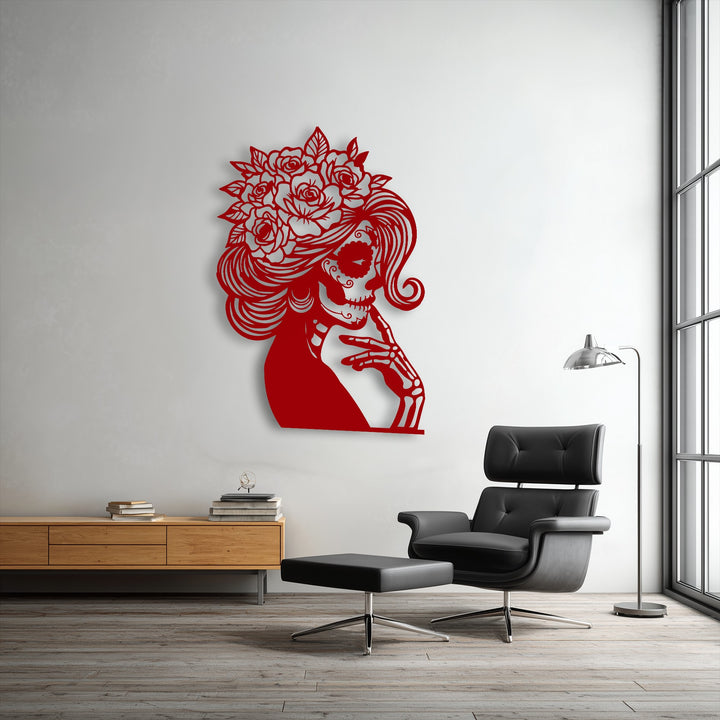 The striking transition between the vibrant red Floral Sugar Skull Lady metal art for wall and the soft white wall creates a bold visual statement.