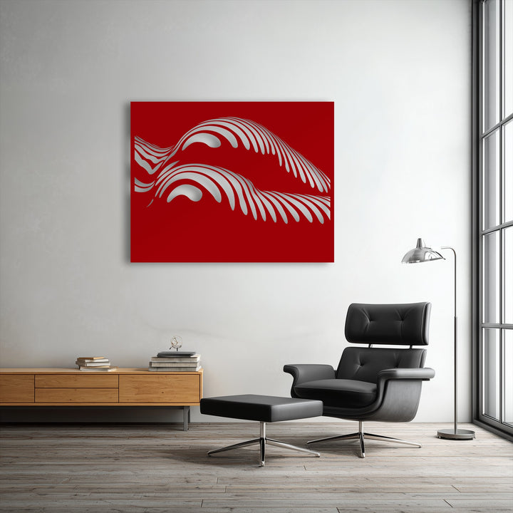A horizontally oriented, rectangular abstract ocean wave metal art for wall features modern flowing silver wave designs on a vibrant red background.