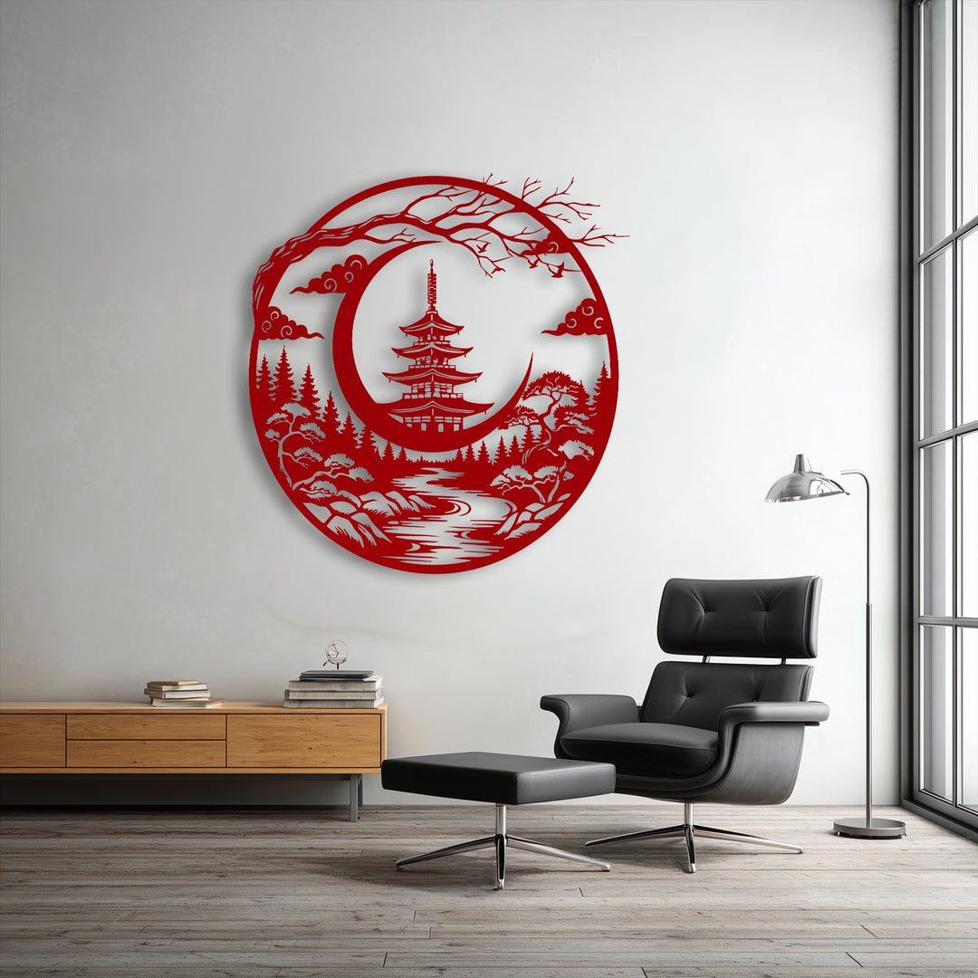 The crisp, laser-cut edges and intricate borders of the circular red metal artwork showcase a serene Japanese pagoda and crescent moon.