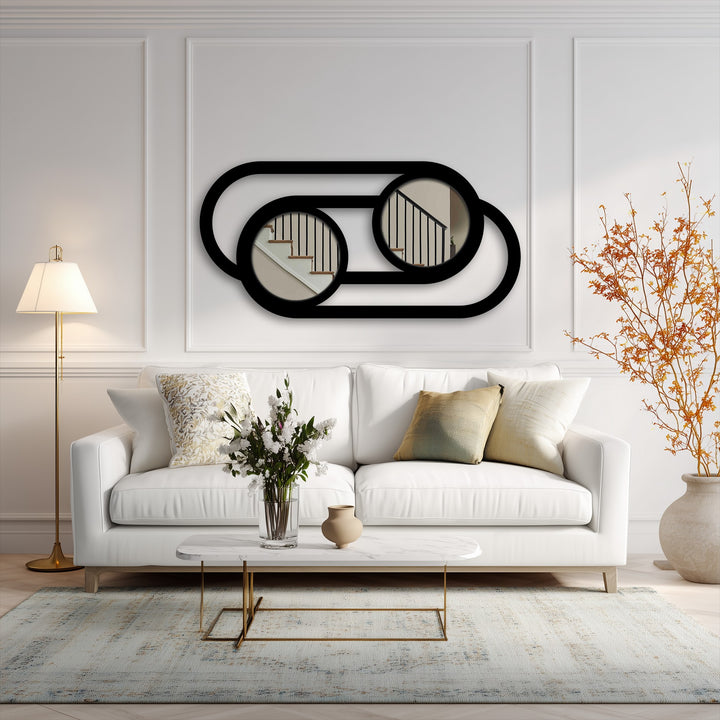 With striking depth and layers, this double circle link metal wall mirror for wall decor features a modern, minimalist design that adds dimension to the room.