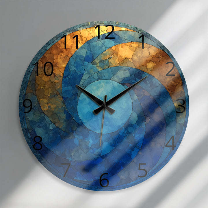 Blaue und goldene Glaswanduhr – abstraktes Kreisdekor