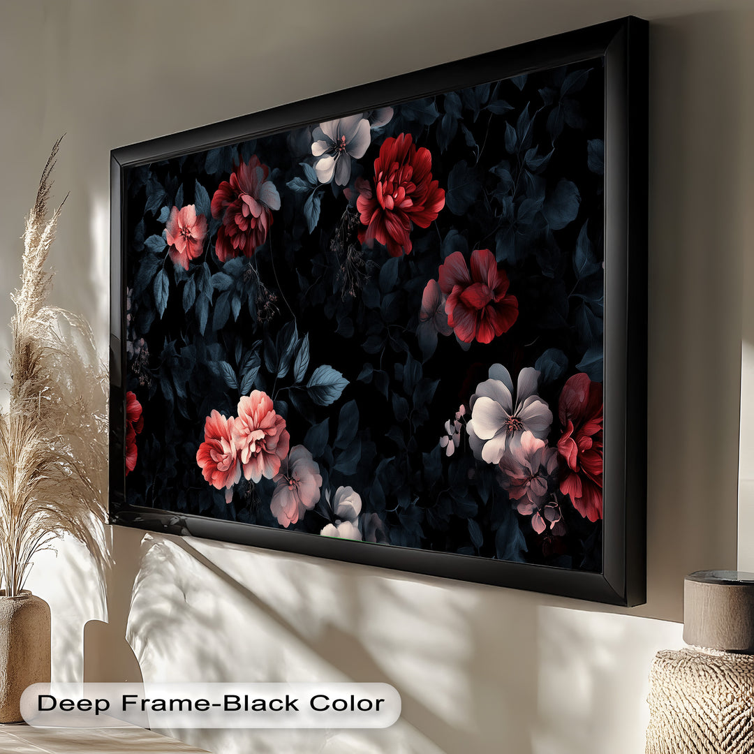 A dramatic floral arrangement featuring soft pink and red blooms set against a dark, moody background with deep blue foliage.