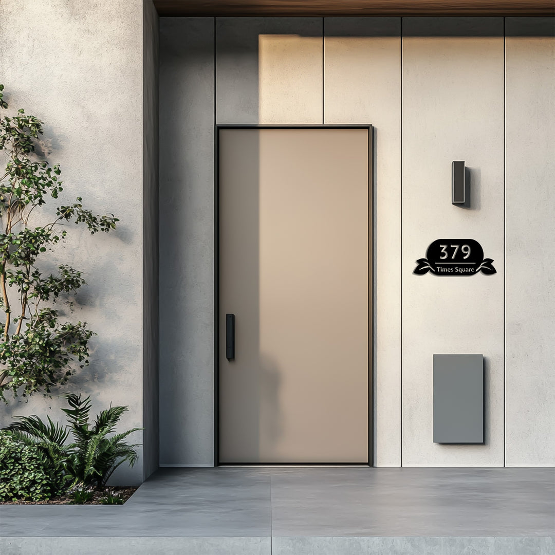 Elegant black metal house plaque with leaves