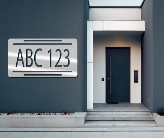Horizontally oriented rectangular decoration wall art, a custom alphanumeric address sign, is displayed, adding a modern touch to the house number plate.