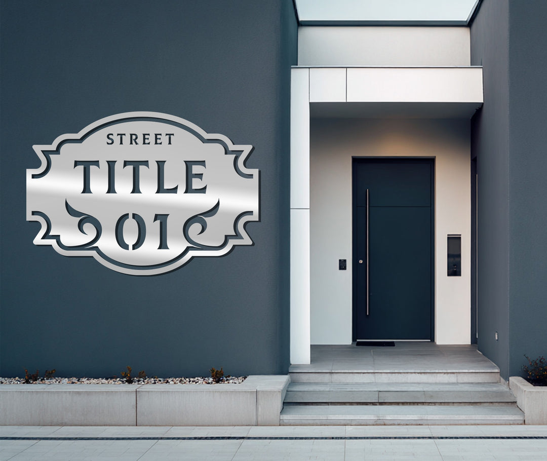 Black ornamental metal street name sign