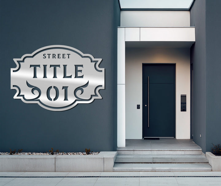 Black ornamental metal street name sign