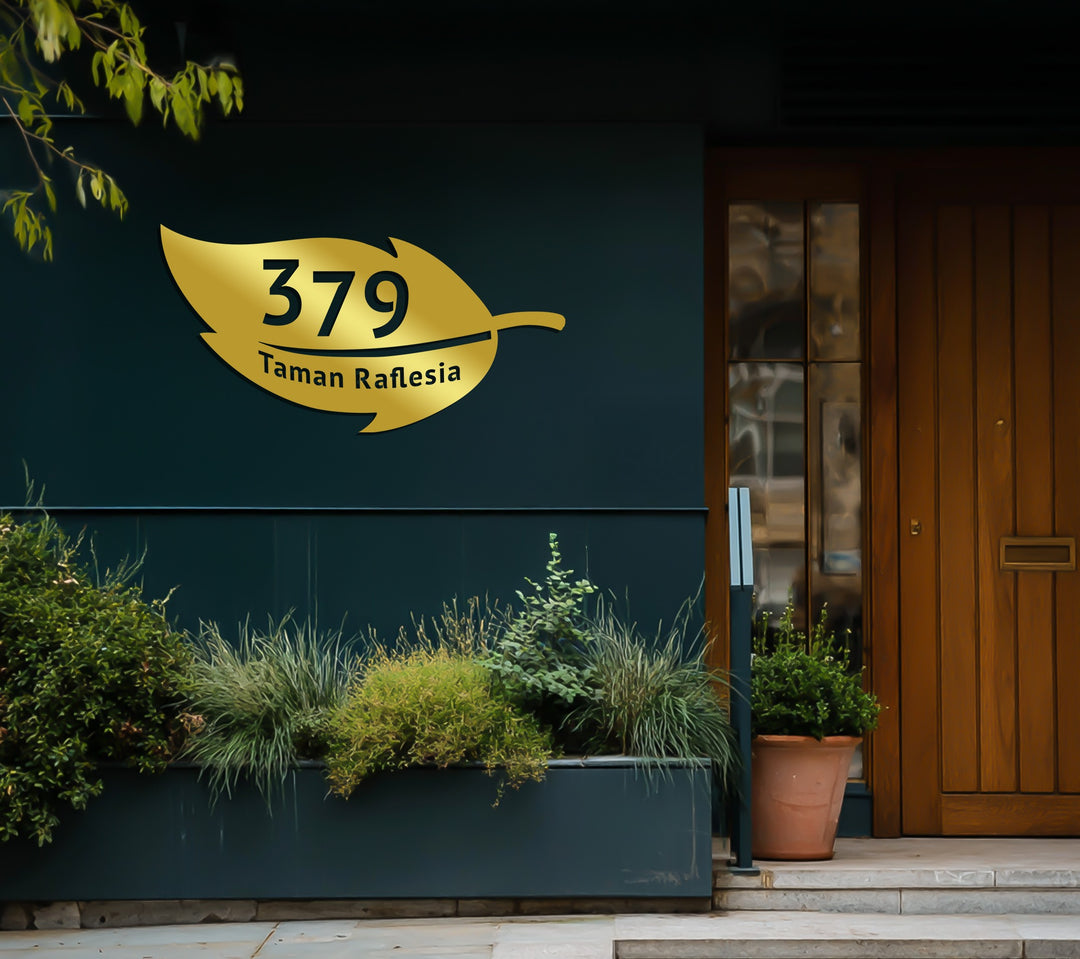 Decorative leaf metal house sign