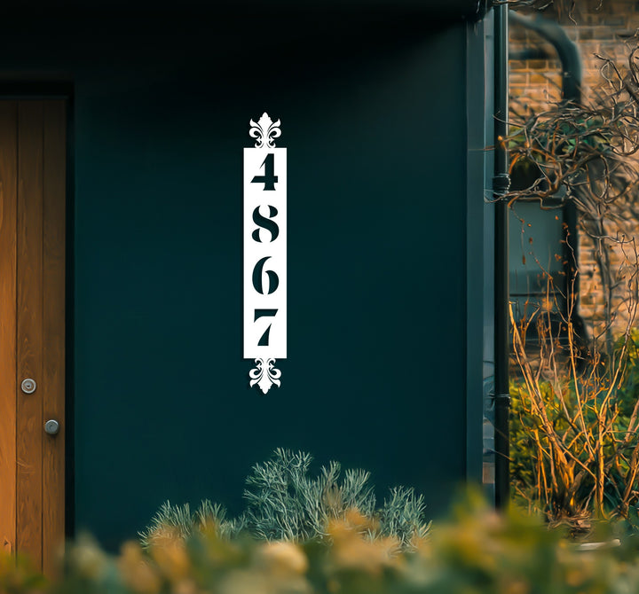 Black decorative vertical metal house number display