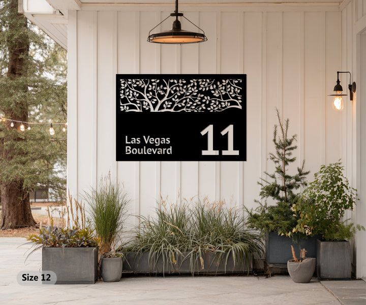 Modern black metal house number tree cutout