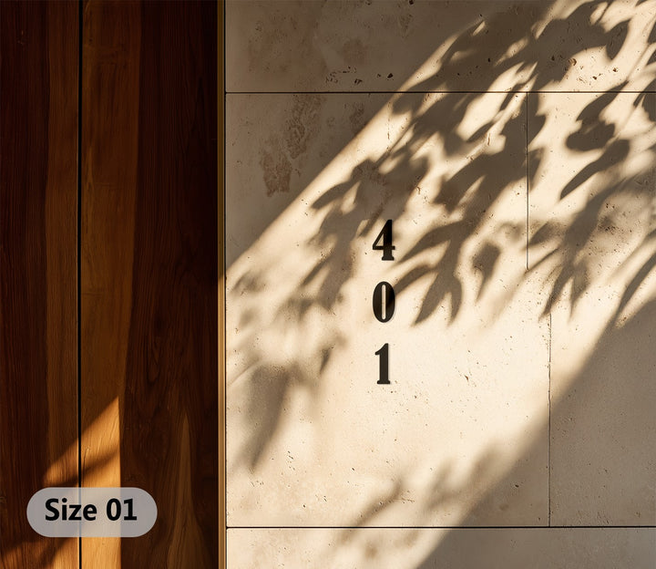 Sleek vertical metal house number display