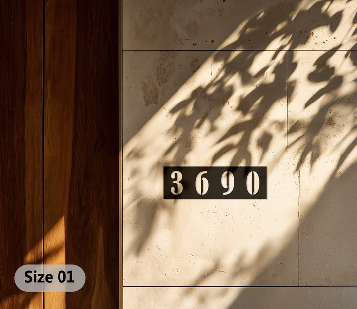 Black horizontal metal house number display