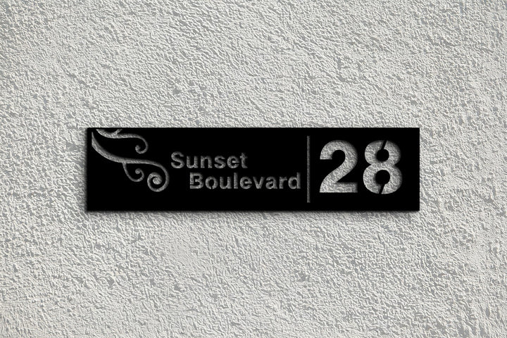 Black metal street name house number sign