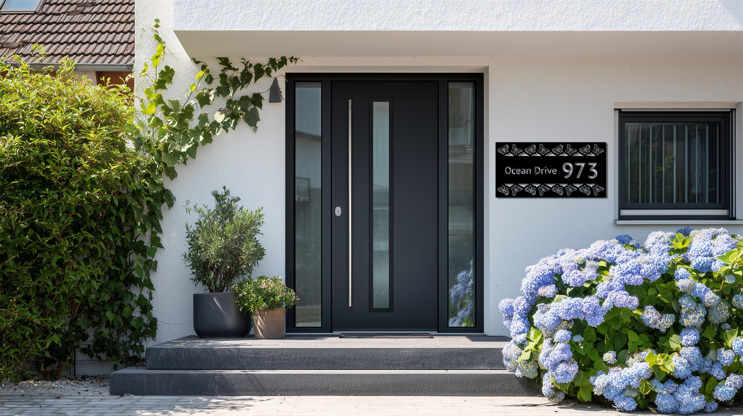 Butterfly metal house number sign with street name