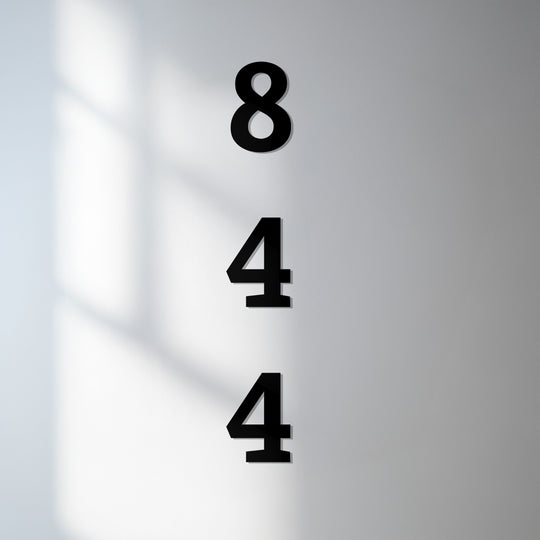 Minimalist decorative metal art number display showcases sharp edges and distinct borders, creating a modern house number statement.