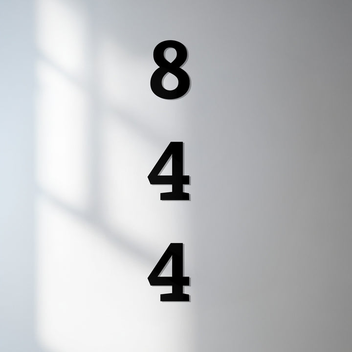 Vertical metal house numbers modern exterior