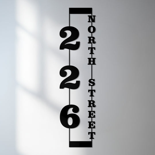 Showing the realistic detail of this modern black decorative metal art features vertical address numbers and street name on a sleek metal house number sign.