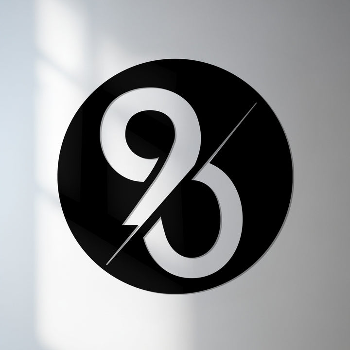 Modern circular metal address sign black