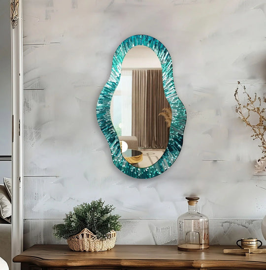 Highlighting the layering effect of the turquoise frame, this decorative wall mirror adds depth and dimension as an artistic bathroom mirror.