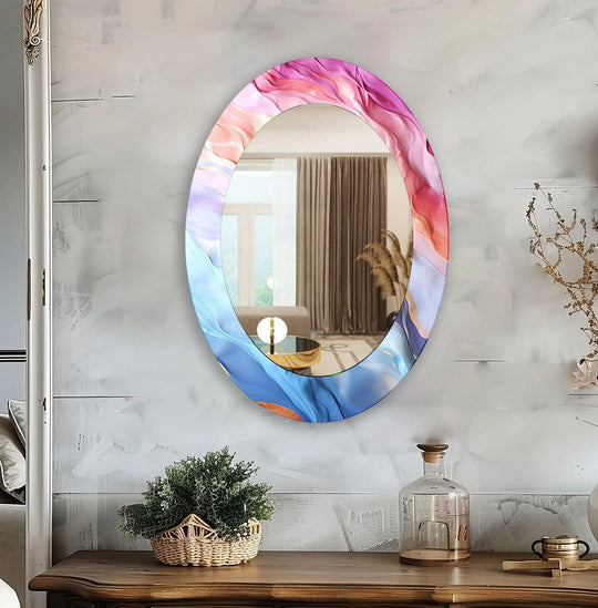 Soft, swirling colors define this abstract oval wall mirror, reflecting the subtle home decor of an inviting living room.