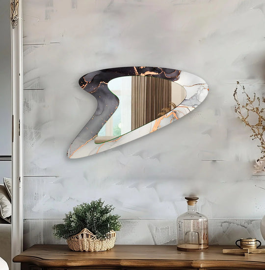 Mirror wall decor combining bold shapes and reflective surfaces to create a striking focal point
