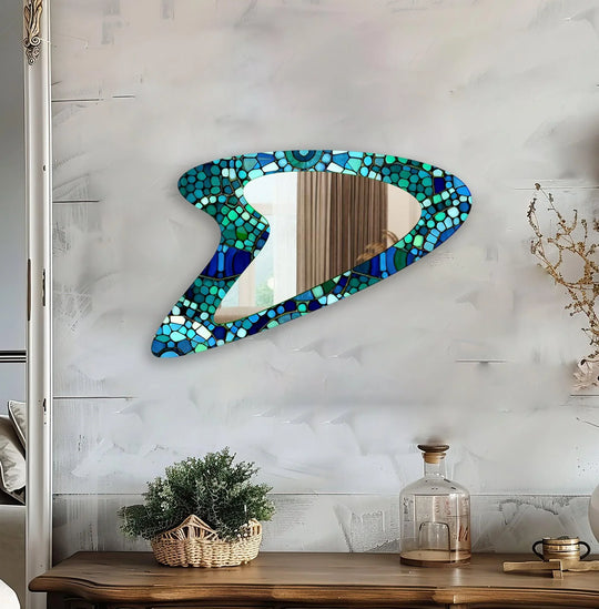 Decorative wall mirror with unique shapes and reflective surfaces for a chic statement