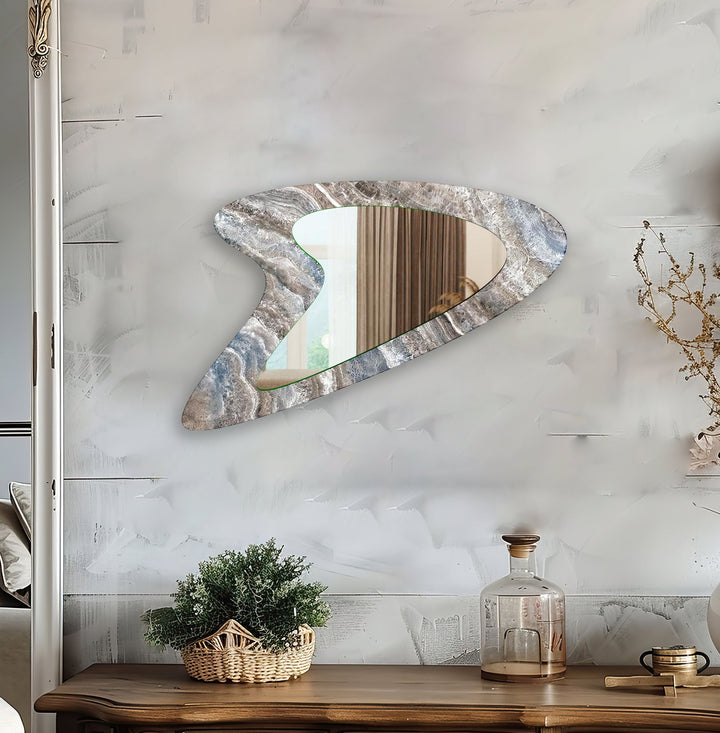 Mirror wall art inspired by abstract forms, perfect for adding a touch of artistic charm
