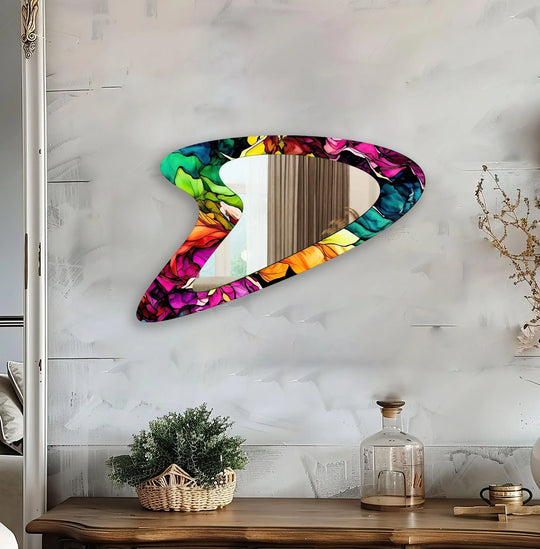 Visual rhythm is achieved through the colorful, fluid patterns adorning this vivid pink modern abstract wall mirror, a striking piece for decorating with wall mirrors.