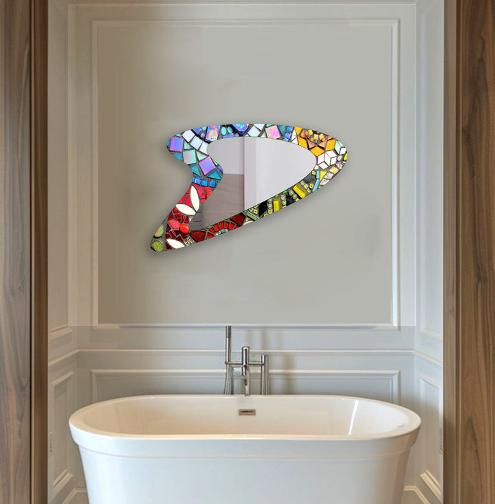 Decorative wall mirror with intricate detailing, perfect for enhancing any interior space
