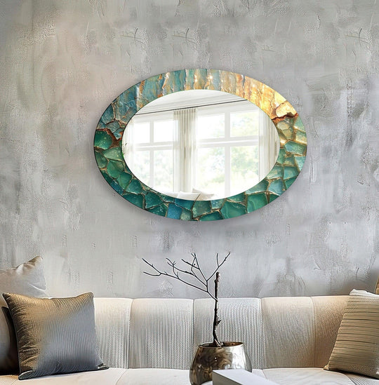 Reflecting the room's brightness, the oval wall mirror with a turquoise stained glass wall mirror frame adds a touch of vibrant art deco style.