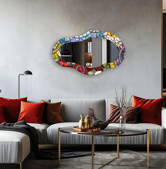 Reflecting a modern interior, the mosaic asymmetrical wall mirror for wall decor serves as the focal point above a contemporary sofa arrangement.