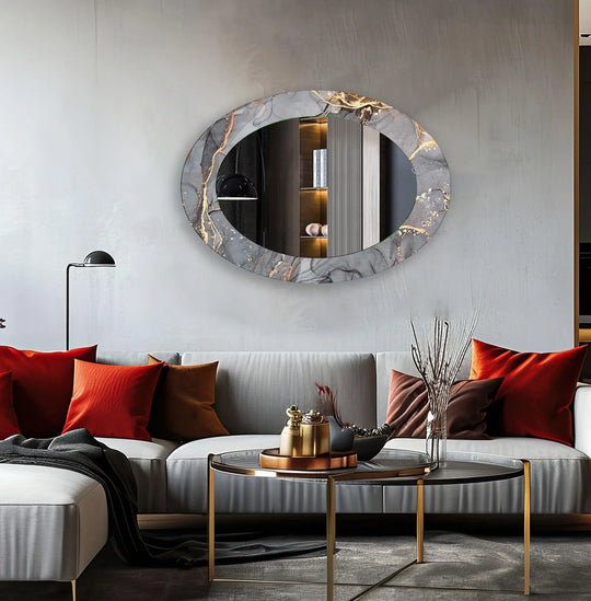 Oval wall mirror with gray and gold abstract patterns featuring elegant durable tempered glass on a light wall