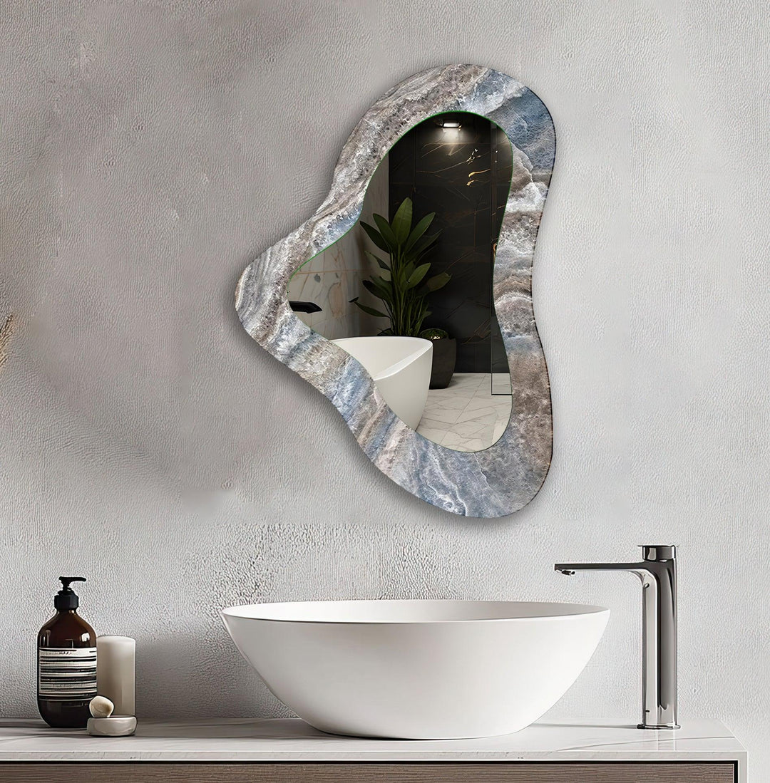 Wall mirrors featuring intricate designs to add depth and light to your living space
