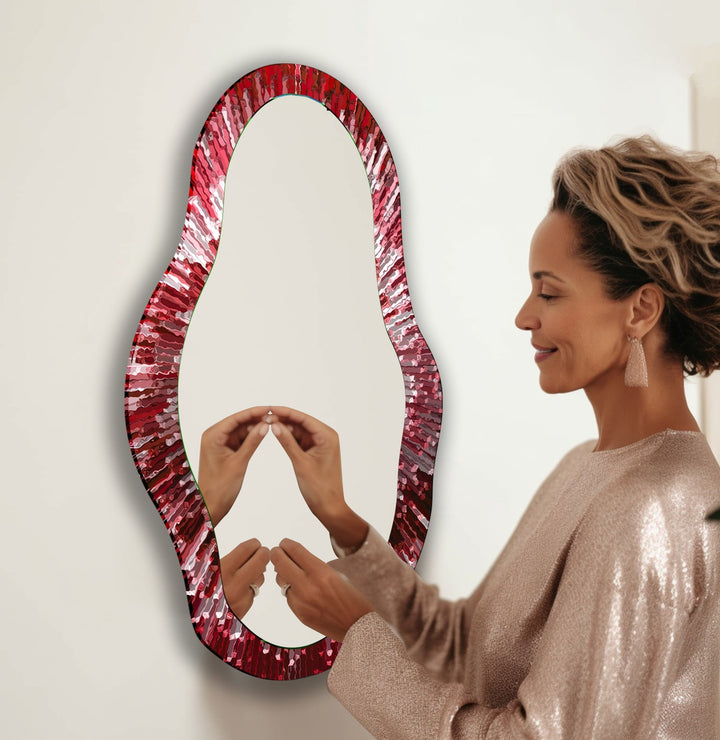Mirror wall art with abstract shapes and reflective surfaces for a modern artistic vibe
