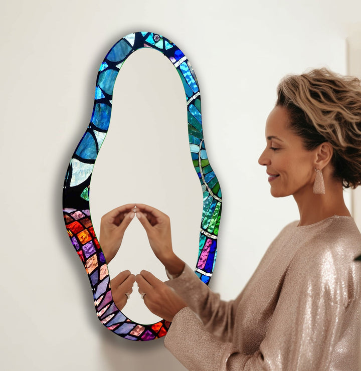 Wall mirrors featuring intricate designs to add depth and light to your living space
