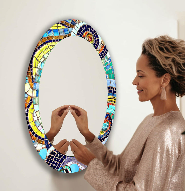 Mirror wall art with abstract shapes and reflective surfaces for a modern artistic vibe
