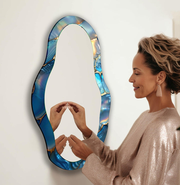Mirror wall decor combining bold shapes and reflective surfaces to create a striking focal point
