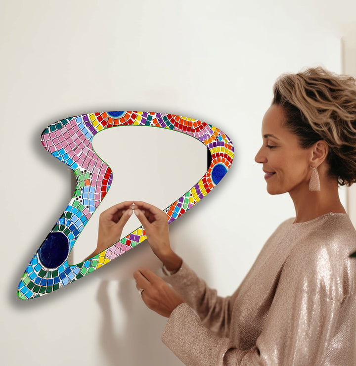 Mirror wall decor combining reflective surfaces and artistic shapes for a stunning focal point
