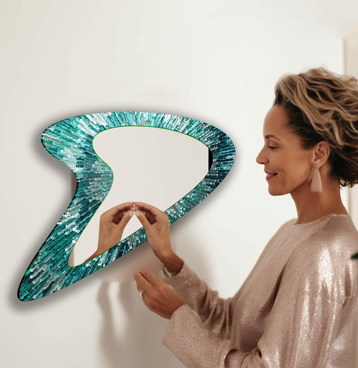 Mirror wall art inspired by geometric designs, adding sophistication to any decor style
