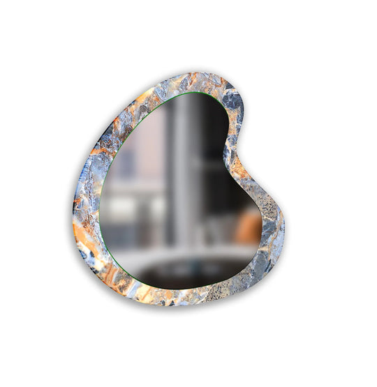 Decorative wall mirror with intricate detailing, perfect for enhancing any interior space
