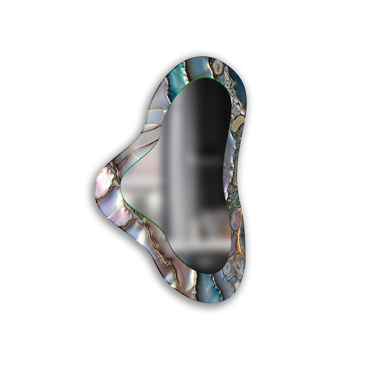 Mirror wall decor combining bold shapes and reflective surfaces to create a striking focal point
